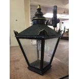 A Victorian style metal coach lamp on bracket