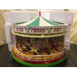 A boxed Corgi fairground attractions carousel and a boxed Hornby fairground attractions traction