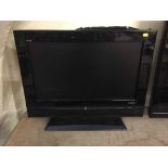 A Sanyo 26 inch LCD TV with remote