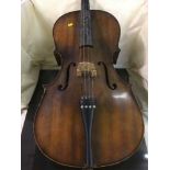 A cello bearing the label Golden Strad by Boosie & Hawkes of London