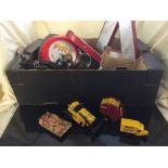 A box of fire bell, vintage miniature sewing machine, die cast vehicles,
