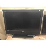 A Bush 37 inch LCD TV with remote