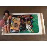 A casino games tables, two mid 20th century dolls,