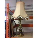 A gilt metal table lamp with shade,