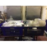 Two baskets of plastic trays, cups,