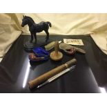 A figure of a horse on plinth and a bag of cased pipes one with silver mount, Victorian postcard,