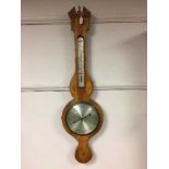 An inlaid mahogany banjo barometer