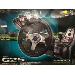 A boxed Logitec G25 steering wheel and foot pedal PC accessory