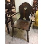 A pine armchair with hand painted floral decoration