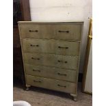 A walnut five drawer chest