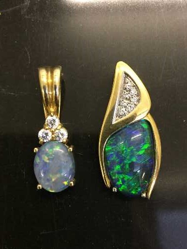 Two 18ct gold opal and diamond pendants, 7.2g.