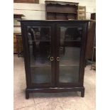 A Stag Minstrel double door bookcase