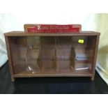 A counter top King Edward cigar display cabinet