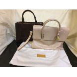 Two Radley leather handbags with cloth bag protectors