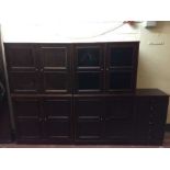 A mahogany effect five section modular cabinet