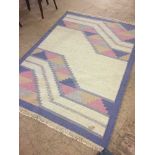 A contemporary pattern fringed wool rug