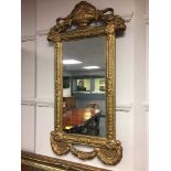 A gilt pier glass hall mirror