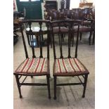 A pair of Victorian high back bedroom chairs