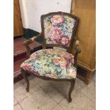 A floral upholstered walnut armchair