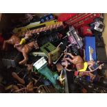 A box of die cast vehicles, plastic soldiers,