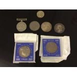 A box of WW II defence medal, silver 1900 Queen Victoria coin, silver dollar,
