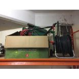 A Qualcast electric mower with box and lead,