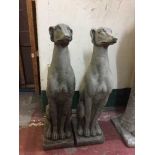 A pair of garden whippet figures