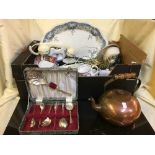 A small tapestry footstool, lazy susan dish and a box of cased cutlery, copper kettle, meat plate,