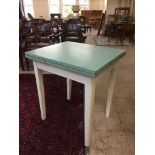 A 1950's melamine topped extending dining table