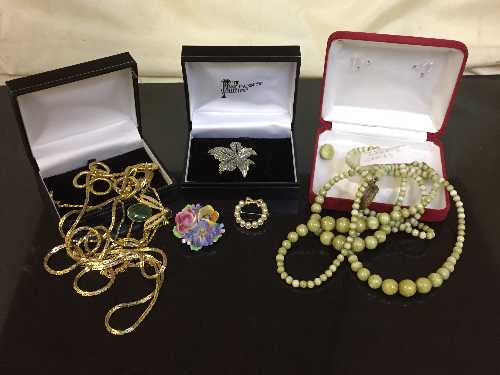 Three boxes of marble beaded necklace, gilt jewellery,