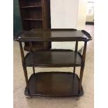 An Ercol three tier serving trolley