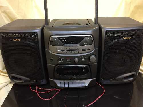 A box of quantity of assorted radios, speakers,