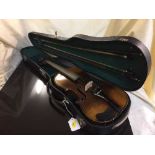 A German violin in shaped case with two bows circa 1890