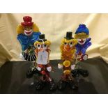 Four Murano glass clown figures