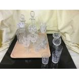 A tray of four lead crystal decanters with stoppers and assorted glass ware