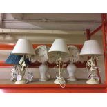 Three contemporary metal table lamps with shades,