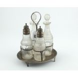 George III silver cruet with four diamond & slice cut bottles,