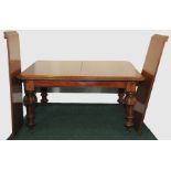 Good Victorian mahogany wind out dining table, the rectangular moulded edge top with two leaves,