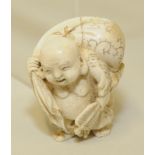 Japanese Meiji period carved ivory netsuke of Hotei carrying a large sack, unsigned, 2" high.
