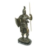 20th century cast bronze figure of a standing classical gladiator on oval black & white marble