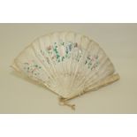 19th century Chinese fan with pierced & carved ivory sticks depicting figures & pavilions amongst