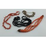 Two coral necklets; another & a costume bracelet.  (4).