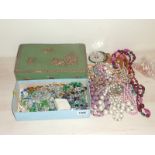 Two boxes containing good selection of beads & other costume jewellery.