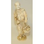 Well carved Japanese Meiji period large ivory okimono of a fisherman & his catch, signed, 14¾" high.