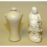 Chinese modern blanc de chine figure of Budai,