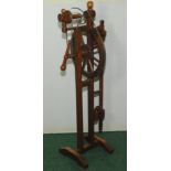 Antique hand cranked upright oak spinning wheel or wool winder, 47" high.