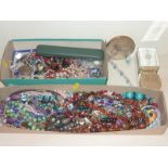 Two boxes containing good selection of beads & other costume jewellery.