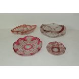 Four pieces of Victorian ruby & cranberry flashed cut glass, comprising: oval fruit bowl,