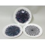 Three Michael Caddy limited edition vintage plates with stylised floral decoration, 10½" diam.  (3).