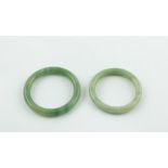 Two jadeite bangles.